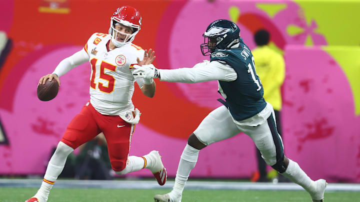 Kansas City Chiefs quarterback Patrick Mahomes (15) is tackled by Philadelphia Eagles linebacker Josh Sweat (19)