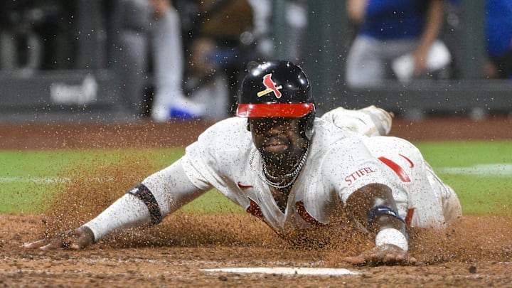 Aug 10, 2025; St. Louis, Missouri, USA; St. Louis Cardinals right fielder Jordan Walker (18) slides head first to score against the Chicago Cubs during the seventh inning at Busch Stadium. Mandatory Credit: Jeff Curry-Imagn Images Aug 10, 2025; St. Louis, Missouri, USA; St. Louis Cardinals right fielder Jordan Walker (18) slides head first to score against the Chicago Cubs during the seventh inning at Busch Stadium. Mandatory Credit: Jeff Curry-Imagn Images