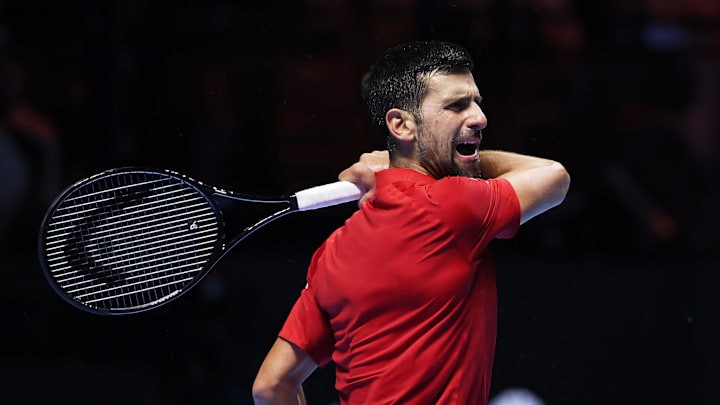 Novak Djokovic hits the ball