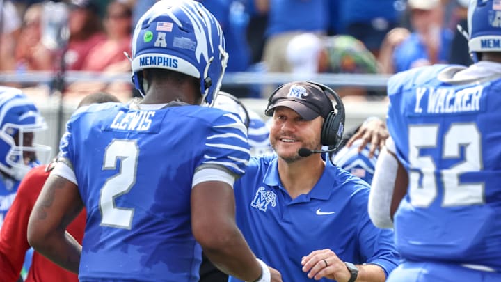 Sep 20, 2025; Memphis, Tennessee, USA; Memphis Tigers Head Coach Ryan Silverfield reacts after a touchdown during the first half against the Arkansas Razorbacks at Simmons Bank Liberty Stadium. Mandatory Credit: Wesley Hale-Imagn Images