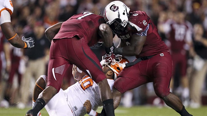 South Carolina football legends Jadeveon Clowney and Melvin Ingram teaming up for a sack of Clemson's Tajh Boyd