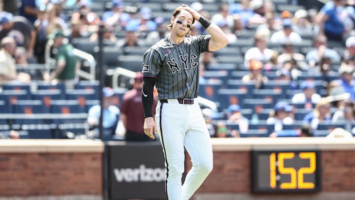 May 25, 2024; New York City, New York, USA;  New York Mets third baseman Brett Baty (22) goes back on the field after striking out to the end the fourth inning against the San Francisco Giants at Citi Field. Mandatory Credit: Wendell Cruz-Imagn Images