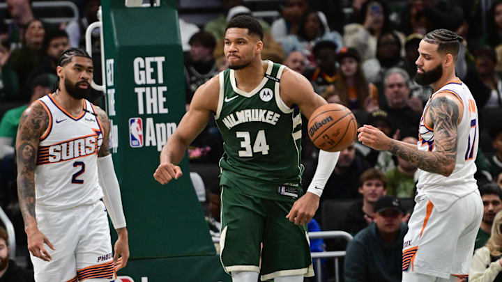 Apr 1, 2025; Milwaukee, Wisconsin, USA; Milwaukee Bucks forward Giannis Antetokounmpo (34) reacts after scoring a basket as Phoenix Suns center Nick Richards (2) and forward Cody Martin (17) looks on in the second quarter at Fiserv Forum. Mandatory Credit: Benny Sieu-Imagn Images Apr 1, 2025; Milwaukee, Wisconsin, USA; Milwaukee Bucks forward Giannis Antetokounmpo (34) reacts after scoring a basket as Phoenix Suns center Nick Richards (2) and forward Cody Martin (17) looks on in the second quarter at Fiserv Forum. Mandatory Credit: Benny Sieu-Imagn Images