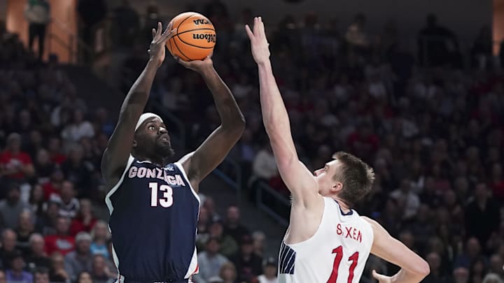 March 12, 2024; Las Vegas, NV, USA; Gonzaga Bulldogs forward Graham Ike (13) shoots the ball over Saint Mary's center Mitchell Saxen March 12, 2024; Las Vegas, NV, USA; Gonzaga Bulldogs forward Graham Ike (13) shoots the ball over Saint Mary's center Mitchell Saxen