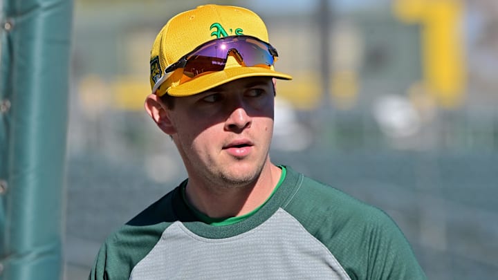 Feb 16, 2024; Mesa, AZ, USA; Oakland Athletics catcher 	Daniel Susac looks on during a Spring Training workout at Hohokum stadium. Mandatory Credit: Matt Kartozian-Imagn Images