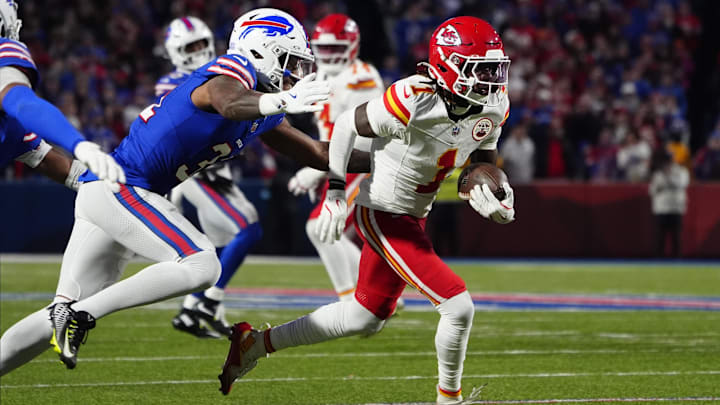 Nov 17, 2024; Orchard Park, New York, USA; Kansas City Chiefs wide receiver Xavier Worthy (1) runs with the ball after making a catch against the Buffalo Bills during the first half at Highmark Stadium. Mandatory Credit: Gregory Fisher-Imagn Images