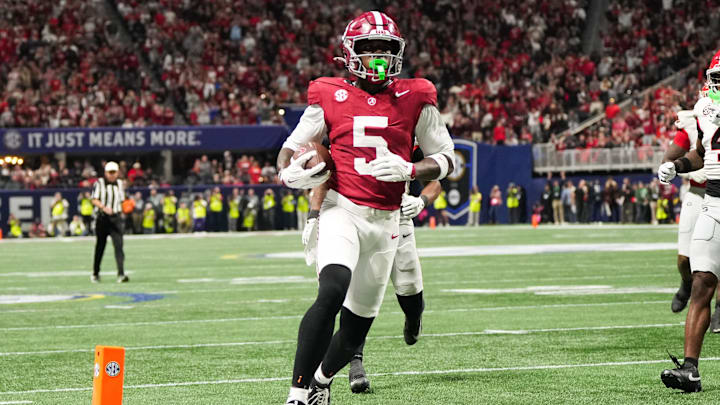 Dec 6, 2025; Atlanta, GA, USA; Alabama Crimson Tide wide receiver Germie Bernard (5) scores a touchdown during the fourth quarter against the Georgia Bulldogs during the 2025 SEC Championship game at Mercedes-Benz Stadium. Mandatory Credit: Dale Zanine-Imagn Images Dec 6, 2025; Atlanta, GA, USA; Alabama Crimson Tide wide receiver Germie Bernard (5) scores a touchdown during the fourth quarter against the Georgia Bulldogs during the 2025 SEC Championship game at Mercedes-Benz Stadium. Mandatory Credit: Dale Zanine-Imagn Images