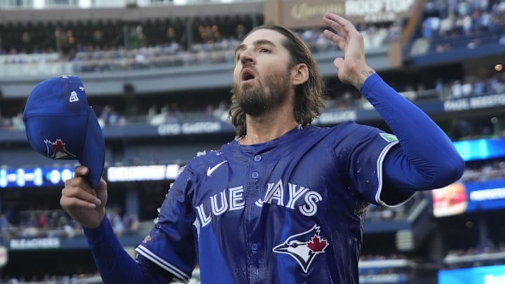 Toronto Blue Jays starting pitcher Kevin Gausman (34) reacts after getting doused with ice water and Gatorade after a complete game win over the Houston Astros at Rogers Centre. 