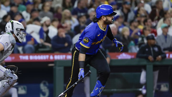 Sep 25, 2025; Seattle, Washington, USA; Seattle Mariners third baseman Eugenio Suarez (28) hits an RBI-single against the Colorado Rockies during the fifth inning at T-Mobile Park.