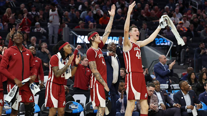 Arkansas Razorbacks (from left) Adou Thiero, Boogie Fland, Trevon Brazile and Zvonimir Ivisic celebrate a moment during Thursday's Sweet 16 match up with Texas Tech in the 2025 NCAA Men's Basketball Tournament. 