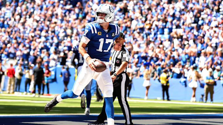 Sep 7, 2025; Indianapolis, Indiana, USA; Indianapolis Colts quarterback Daniel Jones (17) celebrates after a touchdown during the first half at Lucas Oil Stadium. Mandatory Credit: Trevor Ruszkowski-Imagn Images
