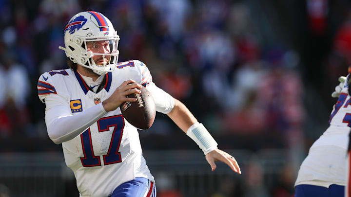 Dec 21, 2025; Cleveland, Ohio, USA;  Buffalo Bills quarterback Josh Allen (17) looks downfield against the Cleveland Browns during the first half at Huntington Bank Field. 