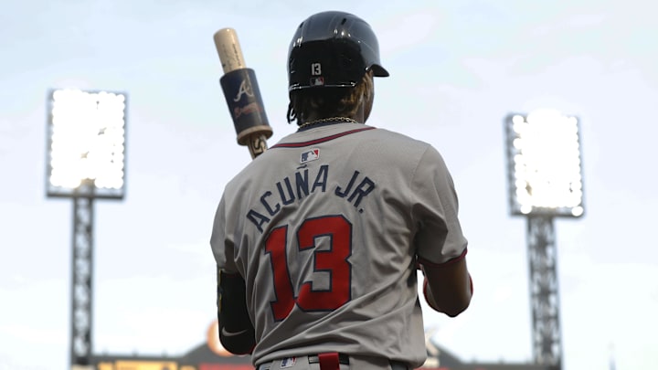 May 24, 2024; Pittsburgh, Pennsylvania, USA;  Atlanta Braves right fielder Ronald Acuna Jr. (13) in the on-deck circle against the Pittsburgh Pirates during the fifth inning  at PNC Park. Mandatory Credit: Charles LeClaire-Imagn Images
