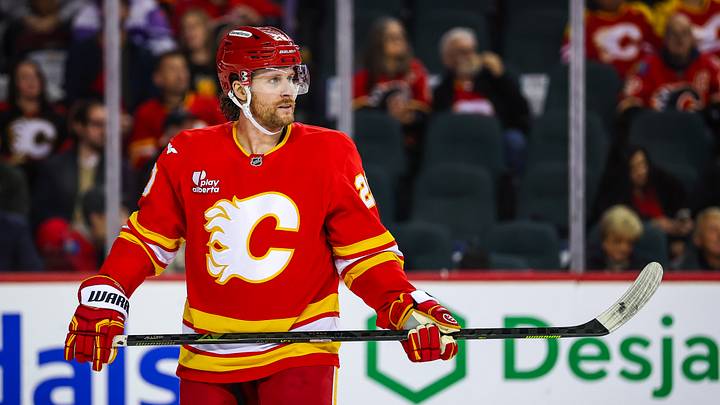 Dec 31, 2025; Calgary, Alberta, CAN; Calgary Flames left wing Blake Coleman (20) against the Philadelphia Flyers during the third period at Scotiabank Saddledome. Mandatory Credit: Sergei Belski-Imagn Images