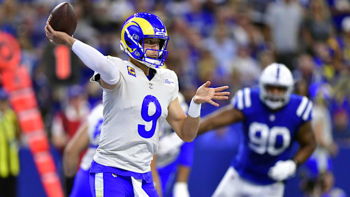 Sep 19, 2021; Indianapolis, Indiana, USA; Los Angeles Rams quarterback Matthew Stafford (9) throws a pass during the second quarter against the Indianapolis Colts at Lucas Oil Stadium. Mandatory Credit: Marc Lebryk-Imagn Images