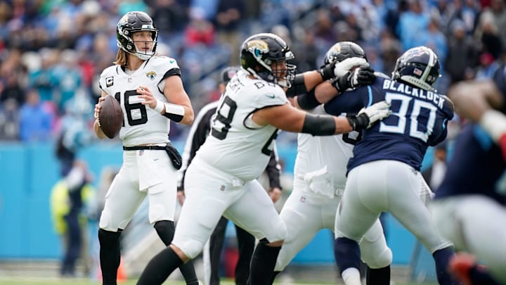 Jacksonville Jaguars quarterback Trevor Lawrence (16) looks for a receiver against the Tennessee Titans during the first quarter at Nissan Stadium in Nashville, Tenn., Sunday, Jan. 7, 2024.