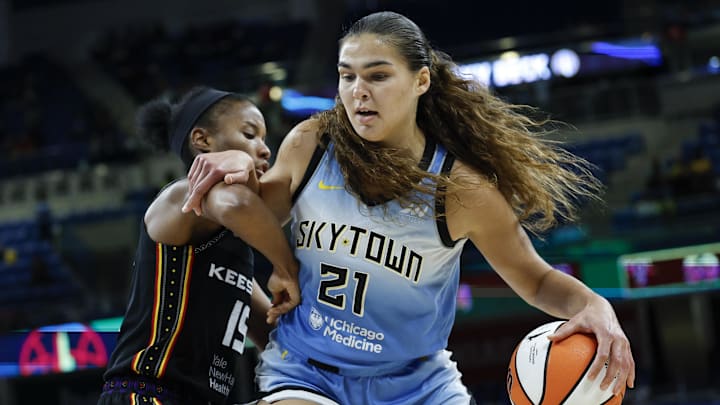 Sep 3, 2025; Chicago, Illinois, USA; Chicago Sky forward Maddy Westbeld (21) drives to the basket against Connecticut Sun guard Lindsay Allen (15) during the second half at Wintrust Arena. Mandatory Credit: Kamil Krzaczynski-Imagn Images