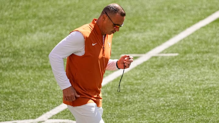 Texas Longhorns head coach Steve Sarkisian runs across the field during warm-ups prior to the NCAA football game against the Ohio State Buckeyes at Ohio Stadium on Aug. 30, 2025.