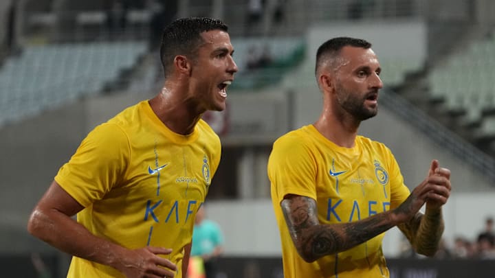 Cristiano Ronaldo y Marcelo Brozovic.