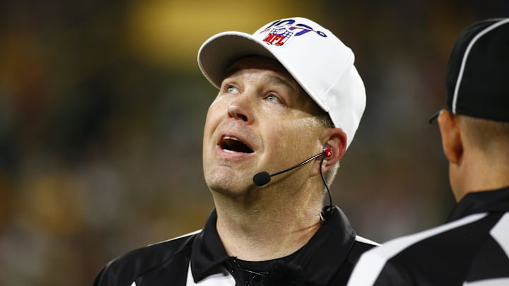 Referee Brad Rogers calls for a Packers first down after reviewing the play in the third quarter of their preseason game against the Houston Texans Thursday, August 8, 2019 at Lambeau Field in Green Bay, Wis.