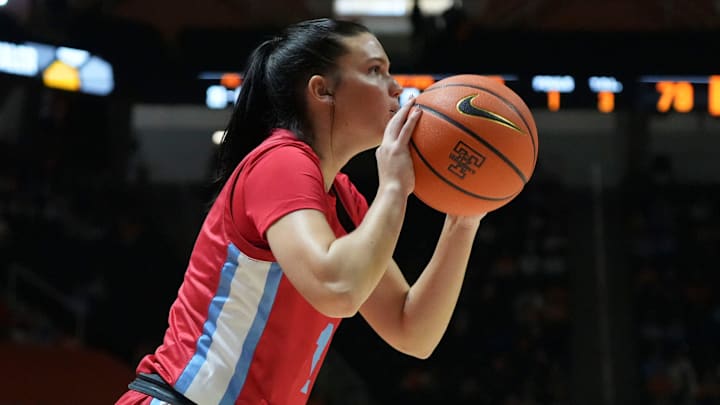 Liberty's Avery Mills (1) with the 3-point shot during an NCAA college basketball game against Tennessee on Saturday, Nov. 16, 2024, in Knoxville, Tenn.