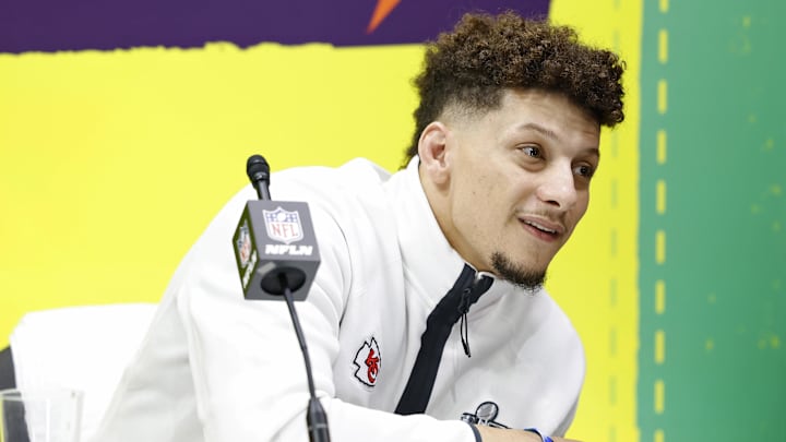 Feb 3, 2025; New Orleans, LA, USA; Kansas City Chiefs quarterback Patrick Mahomes (15) talks to the media during Super Bowl LIX Opening Night at Ceasars Superdome. Mandatory Credit: Stephen Lew-Imagn Images