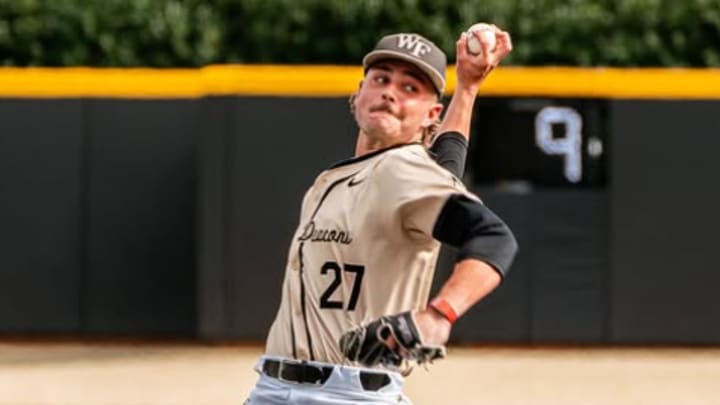 Wake Forest right-hander Luke Schmolke throws a pitch against West Virginia on Oct 26, 2025. Wake Forest right-hander Luke Schmolke throws a pitch against West Virginia on Oct 26, 2025.