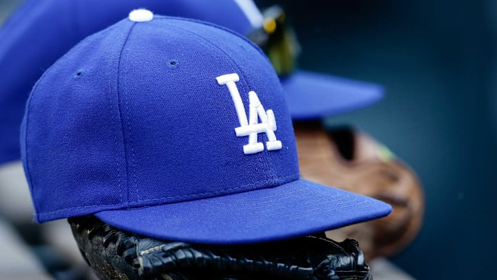 Apr 9, 2017; Denver, CO, USA; A general view of a Los Angeles Dodgers hat and glove on the bench in the seventh inning of the game against the Colorado Rockies at Coors Field. Mandatory Credit: Isaiah J. Downing-Imagn Images