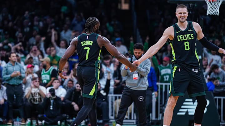 Nov 25, 2024; Boston, Massachusetts, USA; Boston Celtics guard Jaylen Brown (7) reacts with center Kristaps Porzingis (8) after his three point basket against the LA Clippers in the second quarter at TD Garden. Mandatory Credit: David Butler II-Imagn Images Nov 25, 2024; Boston, Massachusetts, USA; Boston Celtics guard Jaylen Brown (7) reacts with center Kristaps Porzingis (8) after his three point basket against the LA Clippers in the second quarter at TD Garden. Mandatory Credit: David Butler II-Imagn Images