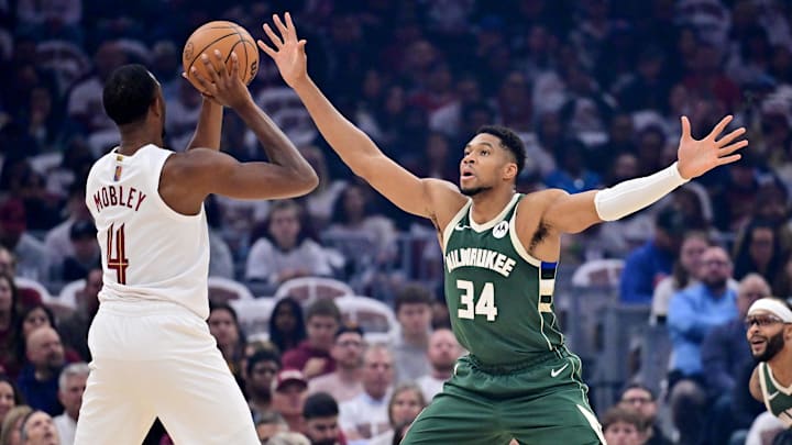 Oct 26, 2025; Cleveland, Ohio, USA: Milwaukee Bucks forward Giannis Antetokounmpo (34) defends Cleveland Cavaliers center Evan Mobley (4) during the first quarter at Rocket Arena. Mandatory Credit: Ken Blaze-Imagn Images Oct 26, 2025; Cleveland, Ohio, USA: Milwaukee Bucks forward Giannis Antetokounmpo (34) defends Cleveland Cavaliers center Evan Mobley (4) during the first quarter at Rocket Arena. Mandatory Credit: Ken Blaze-Imagn Images