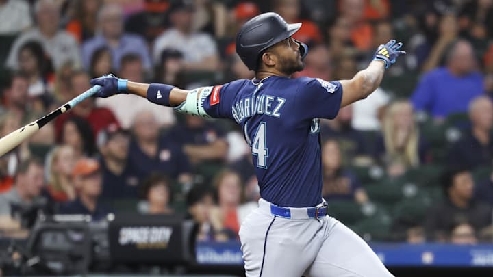 May 11, 2026; Houston, Texas, USA; Seattle Mariners center fielder Julio Rodriguez (44) hits a home run during the third inning against the Houston Astros at Daikin Park. Mandatory Credit: Troy Taormina-Imagn Images