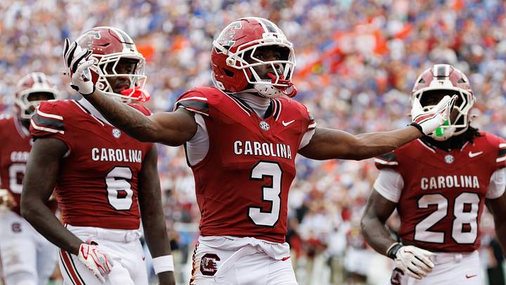 Oct 10, 2026; Gainesville, Florida, USA; South Carolina Gamecocks wide receiver Mazeo Bennett Jr. (3) gestures after scoring a touchdown with South Carolina Gamecocks wide receiver Donovan Murph (6) and South Carolina Gamecocks running back Matt Fuller (28) against the Florida Gators during the first half at Ben Hill Griffin Stadium. Mandatory Credit: Matt Pendleton-Imagn Images Oct 10, 2026; Gainesville, Florida, USA; South Carolina Gamecocks wide receiver Mazeo Bennett Jr. (3) gestures after scoring a touchdown with South Carolina Gamecocks wide receiver Donovan Murph (6) and South Carolina Gamecocks running back Matt Fuller (28) against the Florida Gators during the first half at Ben Hill Griffin Stadium. Mandatory Credit: Matt Pendleton-Imagn Images