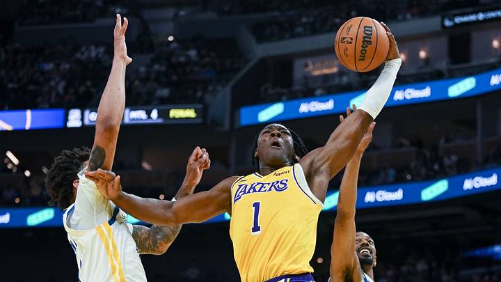 Oct 6, 2026; San Francisco, California, USA;  Los Angeles Lakers guard Adou Thiero (1) attempts to dunk the ball against the Golden State Warriors during the second quarter at Chase Center.  Mandatory Credit: Ed Szczepanski-Imagn Images