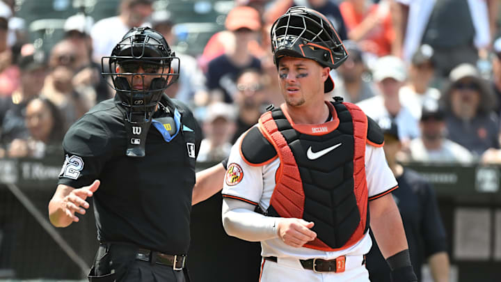 Jul 14, 2024; Baltimore, Maryland, USA; Baltimore Orioles catcher James McCann (27) and umpire Emil Jimenez (82) look towards the dugout during the eighth inning against the New York Yankees at Oriole Park at Camden Yards. Jul 14, 2024; Baltimore, Maryland, USA; Baltimore Orioles catcher James McCann (27) and umpire Emil Jimenez (82) look towards the dugout during the eighth inning against the New York Yankees at Oriole Park at Camden Yards.
