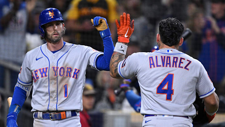 Jul 8, 2023; San Diego, California, USA; New York Mets catcher Francisco Alvarez (4) is congratulated by second baseman Jeff McNeil (1) after hitting a home run against the San Diego Padres during the seventh inning at Petco Park. Mandatory Credit: Orlando Ramirez-Imagn Images Jul 8, 2023; San Diego, California, USA; New York Mets catcher Francisco Alvarez (4) is congratulated by second baseman Jeff McNeil (1) after hitting a home run against the San Diego Padres during the seventh inning at Petco Park. Mandatory Credit: Orlando Ramirez-Imagn Images