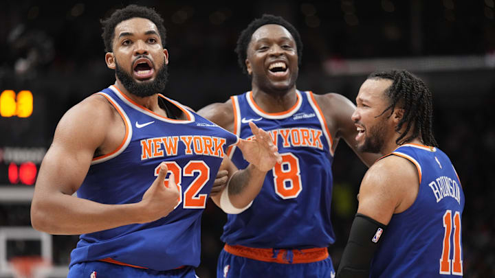 Dec 9, 2024; Toronto, Ontario, CAN; New York  Knicks guard Jalen Brunson (11) and forward OG Anunoby (8) react after a three point basket by center Karl-Anthony Towns (32) to clinch a win over the Toronto Raptors during the second half at Scotiabank Arena.