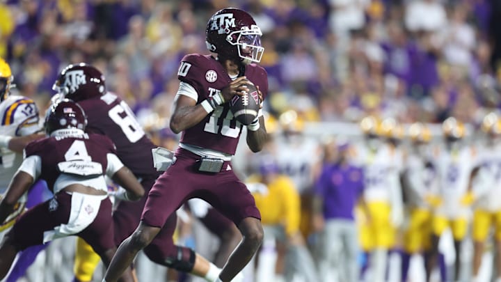 Oct 25, 2025; Baton Rouge, Louisiana, USA; Texas A&M Aggies quarterback Marcel Reed (10) drops to throw during the first half against the Louisiana State Tigers at Tiger Stadium. Mandatory Credit: Stephen Lew-Imagn Images