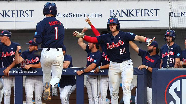 Catcher Austin Fawley reacts with shortstop Brayden Randle, after Randle scored during the seventh inning. Catcher Austin Fawley reacts with shortstop Brayden Randle, after Randle scored during the seventh inning.