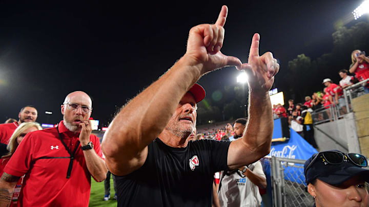 Aug 30, 2025; Pasadena, California, USA;  Utah Utes head coach Kyle Whittingham celebrates the victory against the UCLA Bruins at Rose Bowl. Mandatory Credit: Gary A. Vasquez-Imagn Images