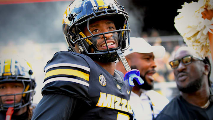 Sep 6, 2025; Columbia, Missouri, USA; Missouri Tigers receiver Kevin Coleman Jr. runs onto the field ahead of the Border War against the Kansas Jayhawks at Faurot Field at Memorial Stadium. Sep 6, 2025; Columbia, Missouri, USA; Missouri Tigers receiver Kevin Coleman Jr. runs onto the field ahead of the Border War against the Kansas Jayhawks at Faurot Field at Memorial Stadium.