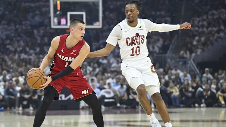 Apr 20, 2025; Cleveland, Ohio, USA; Cleveland Cavaliers guard Darius Garland (10) defends Miami Heat guard Tyler Herro (14) in the first quarter at Rocket Arena. Mandatory Credit: David Richard-Imagn Images