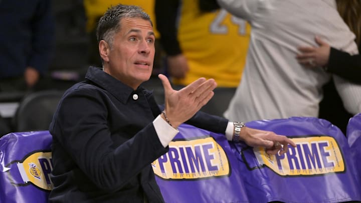Nov 21, 2024; Los Angeles, California, USA;  Los Angeles Lakers general manager Rob Pelinka looks on as players warm up prior to the game against the Orlando Magic at Crypto.com Arena. Mandatory Credit: Jayne Kamin-Oncea-Imagn Images