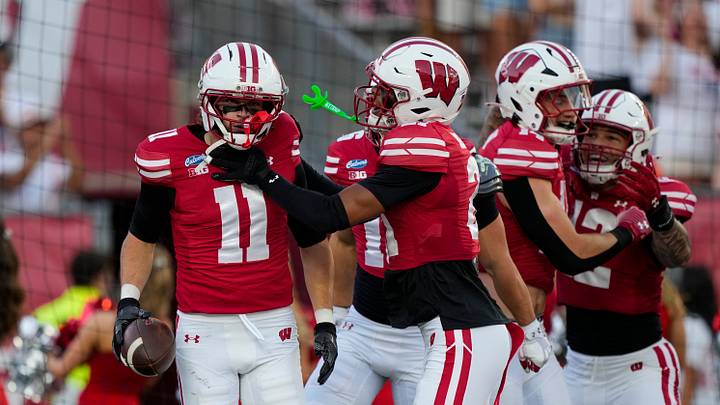 Sep 12, 2026; Madison, Wisconsin, USA; Wisconsin Badgers safety Carson Van Dinter (11) celebrates after recovering a blocked punt to score a touchdown during the first quarter against the Western Illinois Leathernecks at Camp Randall Stadium. Mandatory Credit: Jeff Hanisch-Imagn Images Sep 12, 2026; Madison, Wisconsin, USA; Wisconsin Badgers safety Carson Van Dinter (11) celebrates after recovering a blocked punt to score a touchdown during the first quarter against the Western Illinois Leathernecks at Camp Randall Stadium. Mandatory Credit: Jeff Hanisch-Imagn Images