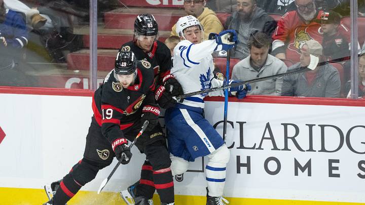 Apr 15, 2026; Ottawa, Ontario, CAN; Ottawa Senators right wing Drake Batherson (19) and center Stephen Halliday (83) battle with Toronto Maple Leafs center Jacob Quillan  (26) in the third period at the Canadian Tire Centre. Mandatory Credit: Marc DesRosiers-IMAGN Images