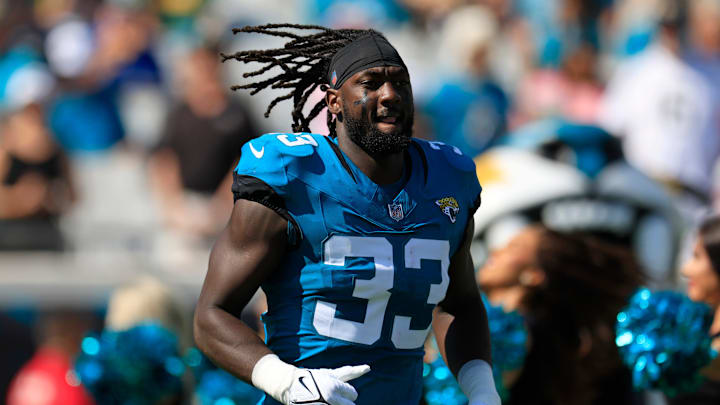 Jacksonville Jaguars linebacker Devin Lloyd (33) is introduced before an NFL football matchup Sunday, Oct. 27, 2024 at EverBank Stadium in Jacksonville, Fla. The Packers edged the Jaguars 30-27 on a last-second field goal. [Corey Perrine/Florida Times-Union]