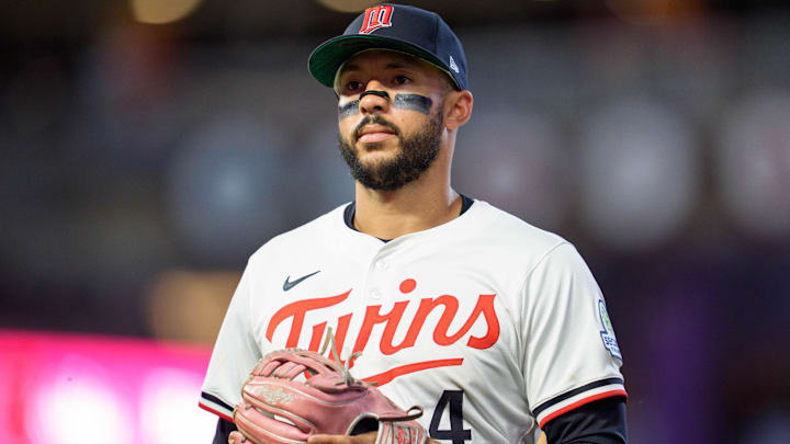 Jul 26, 2025; Minneapolis, Minnesota, USA; Minnesota Twins shortstop Carlos Correa (4) walks to the dugout after the ninth inning against the Washington Nationals at Target Field. Jul 26, 2025; Minneapolis, Minnesota, USA; Minnesota Twins shortstop Carlos Correa (4) walks to the dugout after the ninth inning against the Washington Nationals at Target Field.
