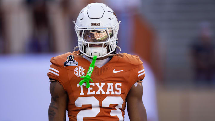 Dec 21, 2024; Austin, Texas, USA; Texas Longhorns running back Jaydon Blue (23) against the Clemson Tigers during the CFP National playoff first round at Darrell K Royal-Texas Memorial Stadium. Mandatory Credit: Mark J. Rebilas-Imagn Images