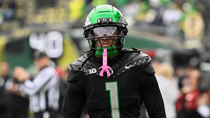 Oct 11, 2025; Eugene, Oregon, USA; Oregon Ducks wide receiver Dakorien Moore (1) warms up before the game against the Indiana Hoosiers at Autzen Stadium. Mandatory Credit: Troy Wayrynen-Imagn Images