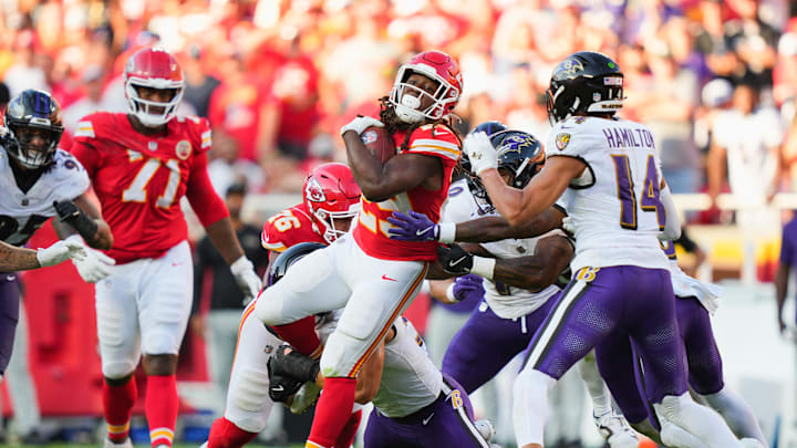 Sep 28, 2025; Kansas City, Missouri, USA; Kansas City Chiefs running back Kareem Hunt (29) rushes as Baltimore Ravens safety Kyle Hamilton (14) defends during the third quarter at GEHA Field at Arrowhead Stadium. Mandatory Credit: Jay Biggerstaff-Imagn Images Sep 28, 2025; Kansas City, Missouri, USA; Kansas City Chiefs running back Kareem Hunt (29) rushes as Baltimore Ravens safety Kyle Hamilton (14) defends during the third quarter at GEHA Field at Arrowhead Stadium. Mandatory Credit: Jay Biggerstaff-Imagn Images