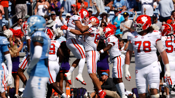 Cade Klubnik celebrates with Christian Bentancur in Clemson v North Carolina game 